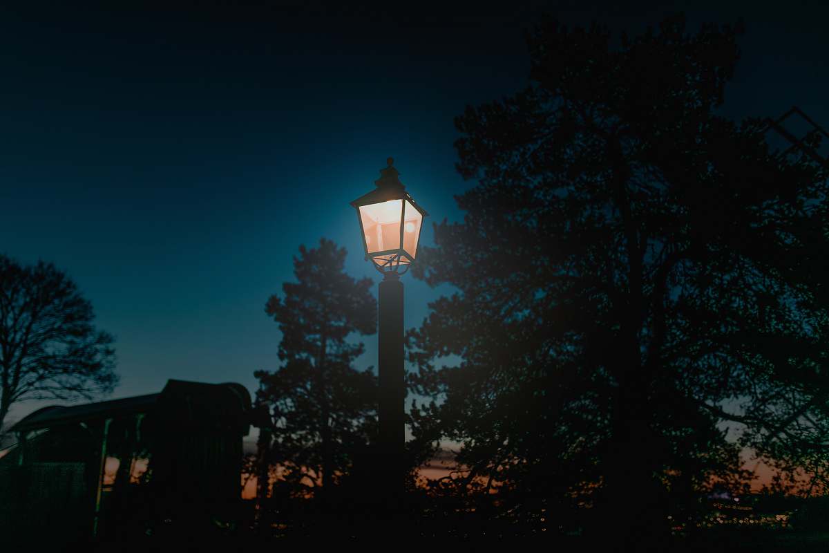 lamp post turned-on lantern post pole